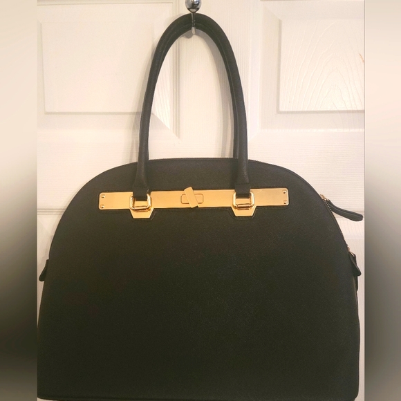 Aldo brand hand bag, medium size. Black with gold accents. - Picture 1 of 2